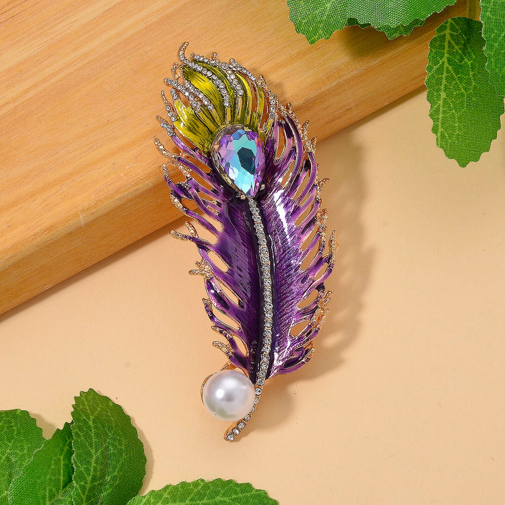 Austrian White Crystal & Purple Magic Color Crystal Pendent Cum Brooch with Enamel in Yellow Gold Plated -Leaf