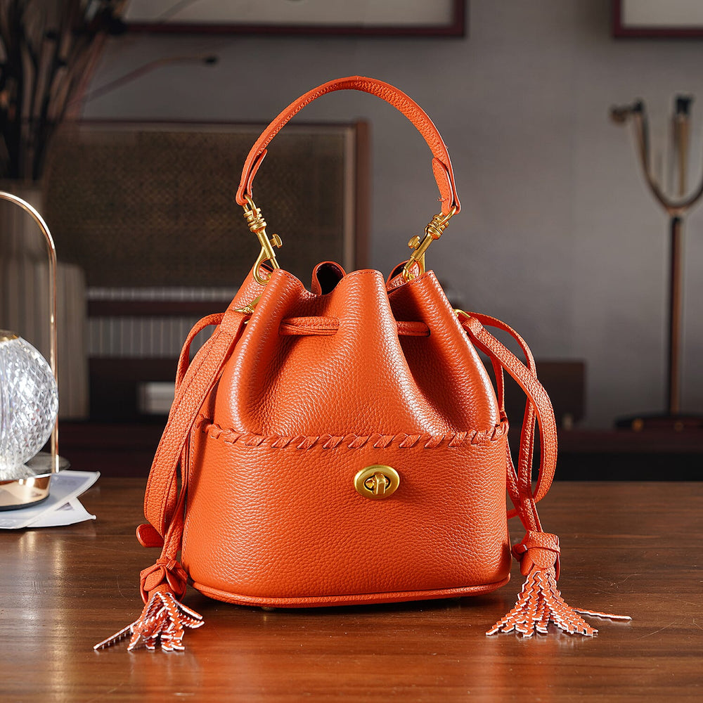 THE AURELLE -Designer Inspired Genuine Leather Fringe Crossbody sinch Bag with Removable Top-Handle, Embedded Fabric Pouch And Gold-Tone Hardware - Orange