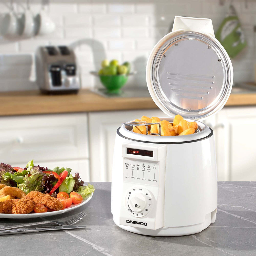 Daewoo Compact Deep Fat Fryer, your space-saving solution for flavourful creations. With a 1-litre capacity