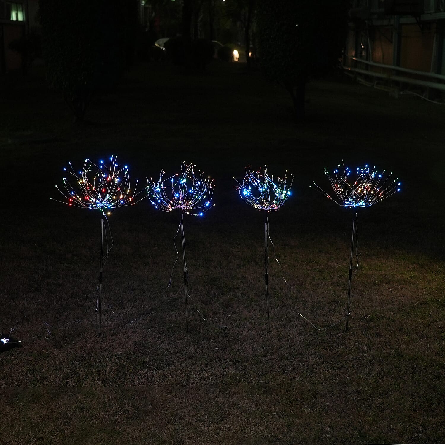 Set of 4 Black Color-Changing Solar Firework Garden Lights with 8 Lighting Modes and Timer