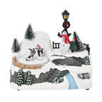 Musical Light up Christmas Village Scene with Rotating Skaters and Snowman