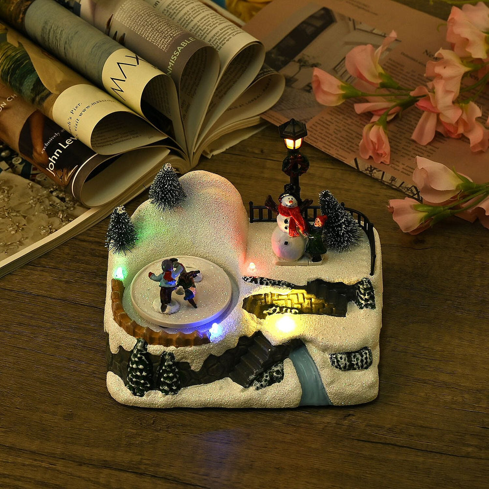 Musical Light up Christmas Village Scene with Rotating Skaters and Snowman
