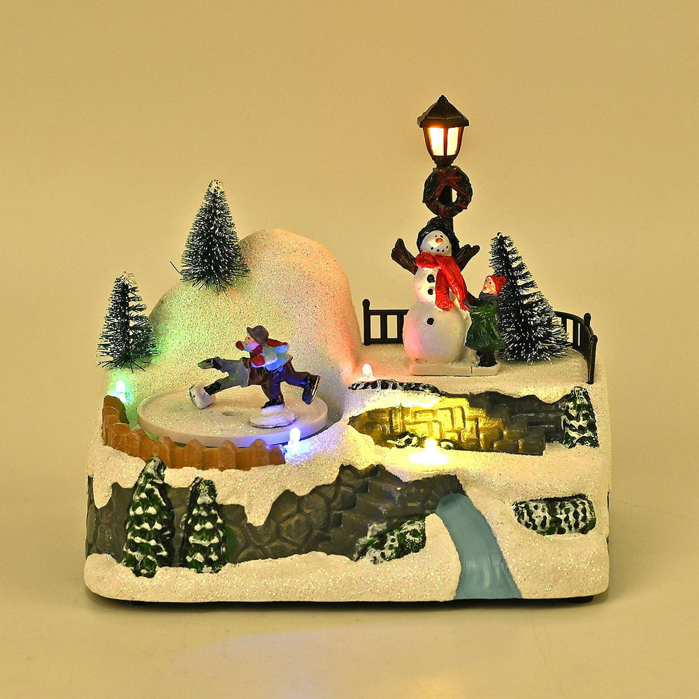 Musical Light up Christmas Village Scene with Rotating Skaters and Snowman