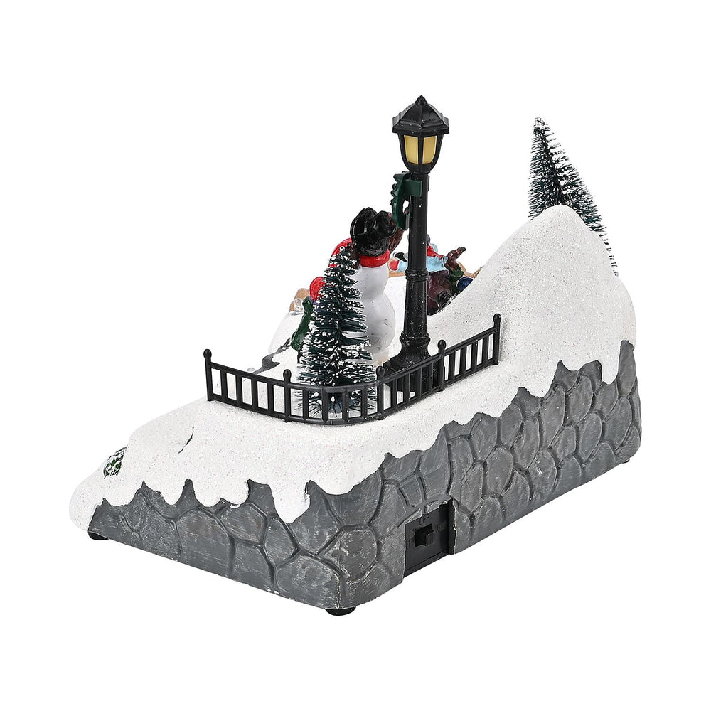 Musical Light up Christmas Village Scene with Rotating Skaters and Snowman