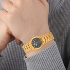 William Hunt Swiss Movt. Diamond Studded 5 ATM Water Resist. Ladies Watch with Green Dial and Yellow Gold Tone in stainless Steel